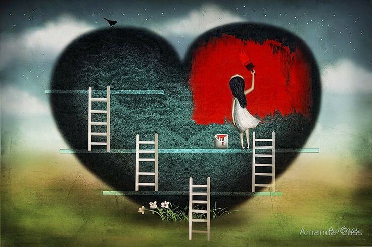 Niña pintando corazón rojo