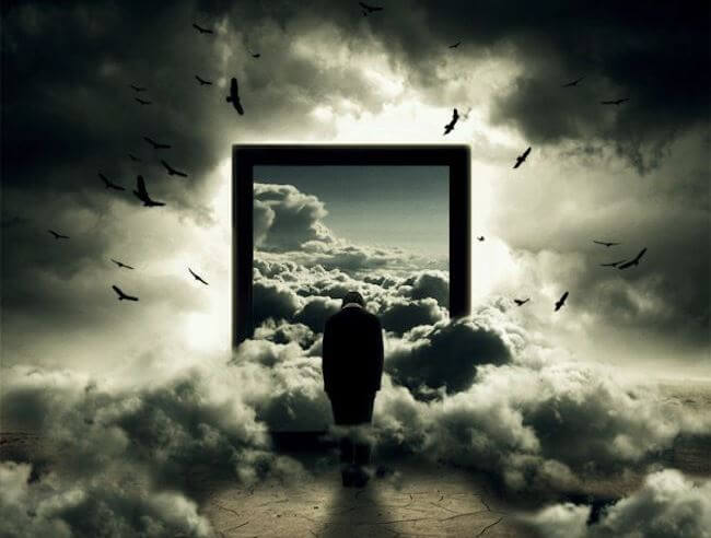 hombre frente a ventana con nubes