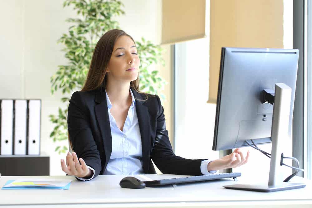 Woman breathing at her workplace
