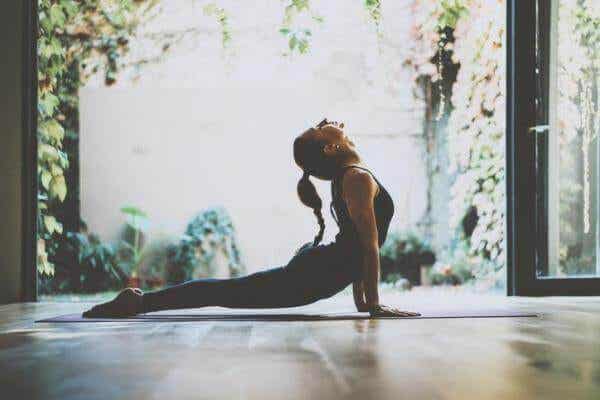 Woman practicing yoga asanas