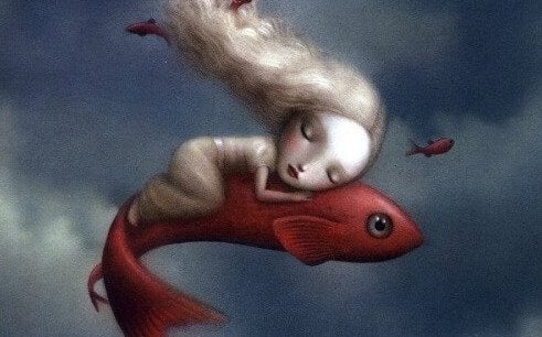 Mujer encima de un pez soñando