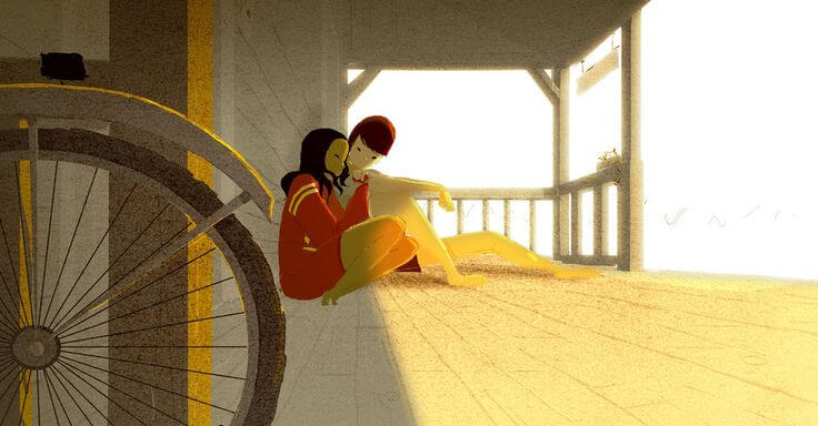 Pareja sentada hablando en el porche