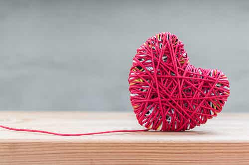 Heart made of red yarn