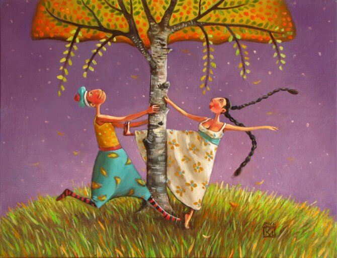 Pareja feliz debajo de un árbol