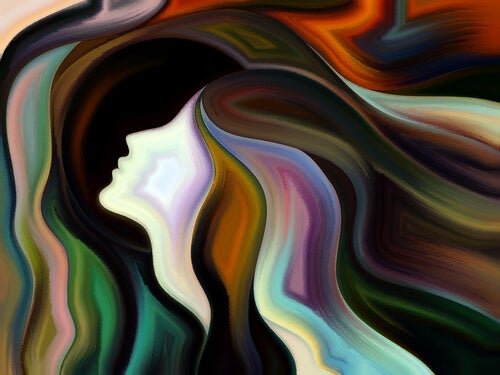 Perfil de cabeza de mujer con pelo de colores