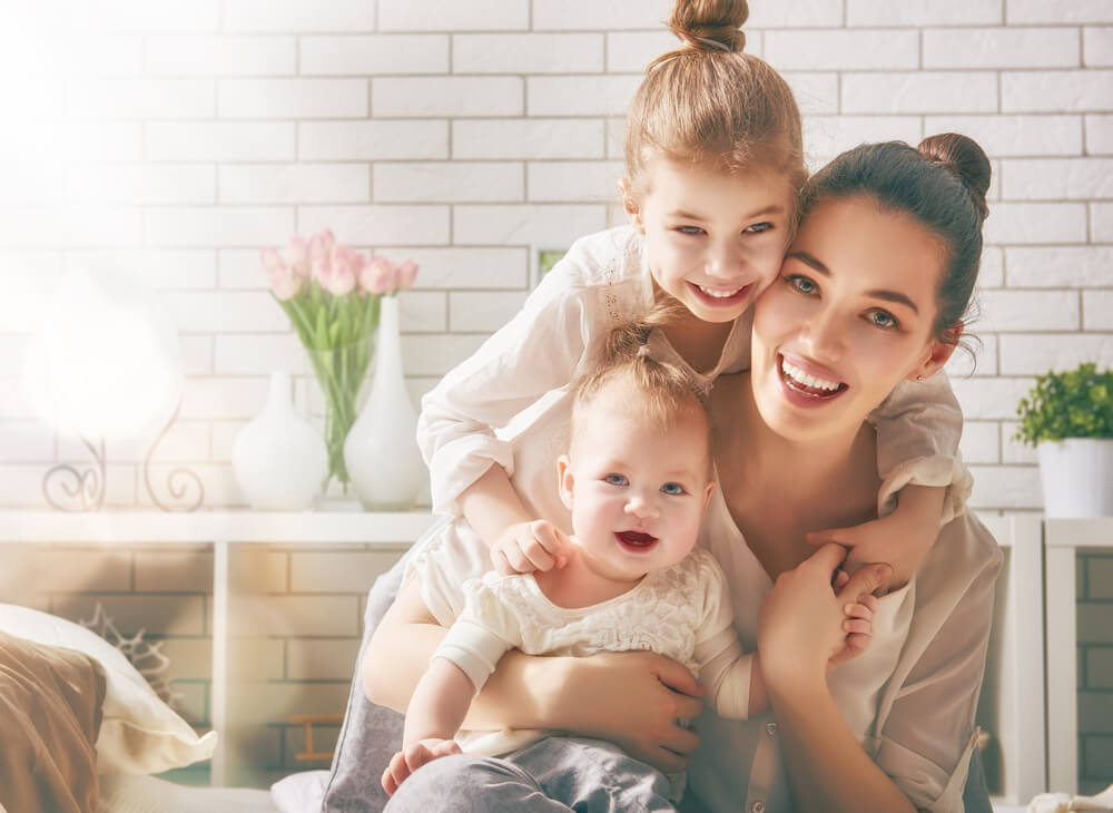 Madre con sus hijos
