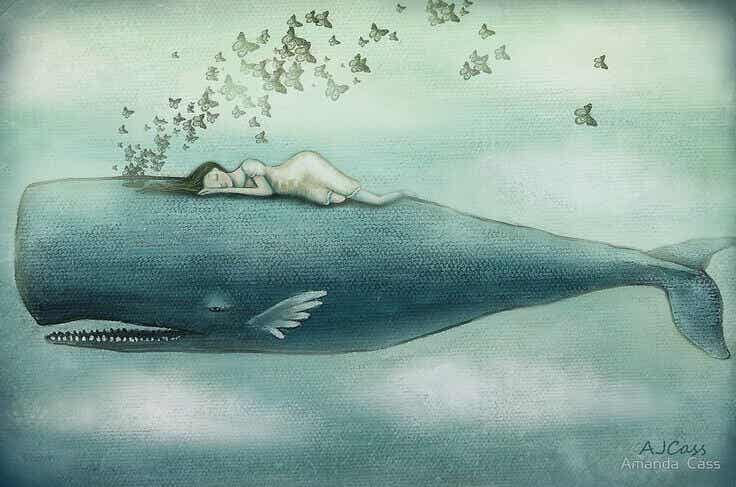 Mujer descansando sobre una ballena