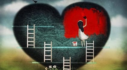 Fille peignant un coeur, image de la vie
