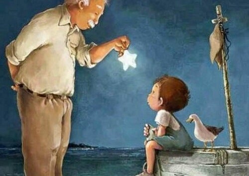 Abuelo enseñando una estrella a su nieto