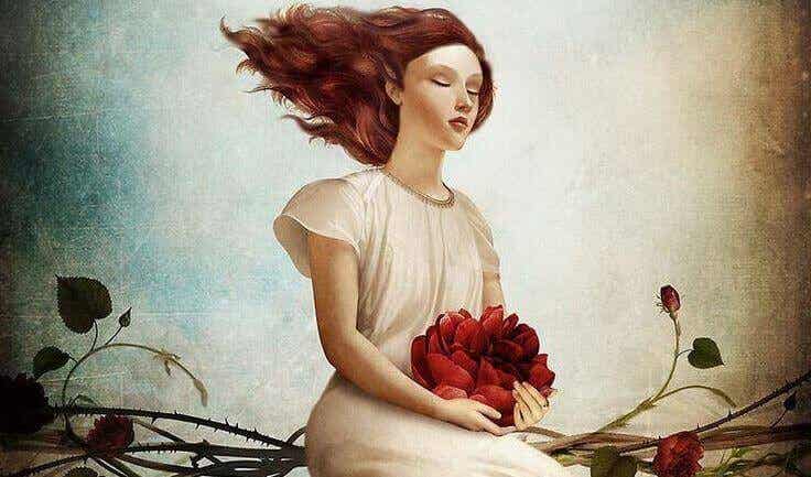 Mujer con flores en la mano