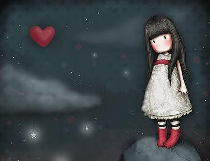 Niña mirando un corazón queriendo enamorarse