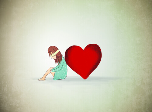 Mujer ojos vendados al lado de un corazón