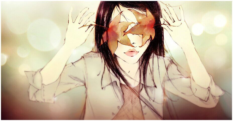 Chica con los ojos tapados por una hoja