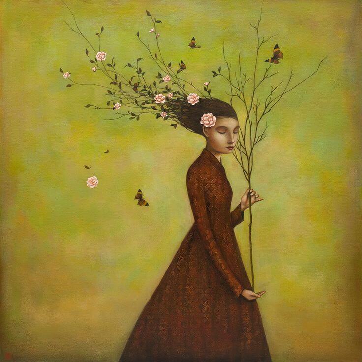 Mujer con árbol sin hojas