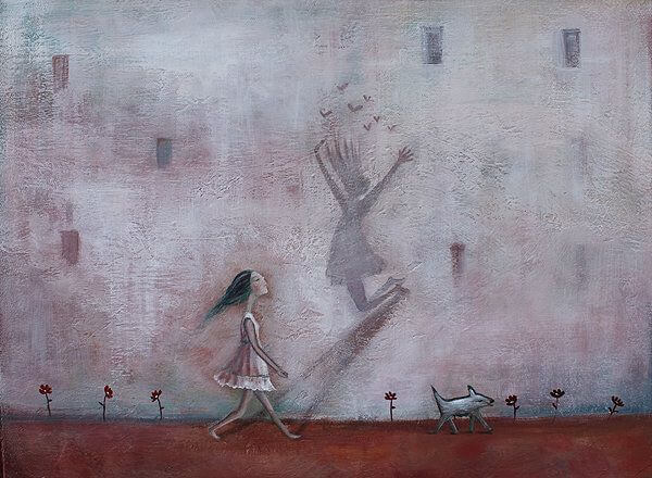 Niña con sombra saltando