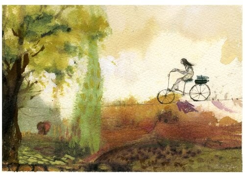 Niña en bicicleta e equilibrio