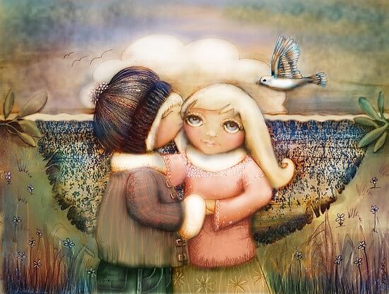 Niño dando un beso a su amiga