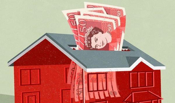 hucha en forma de casa con libras