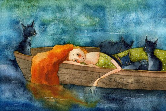 Mujer en un barco con gatos