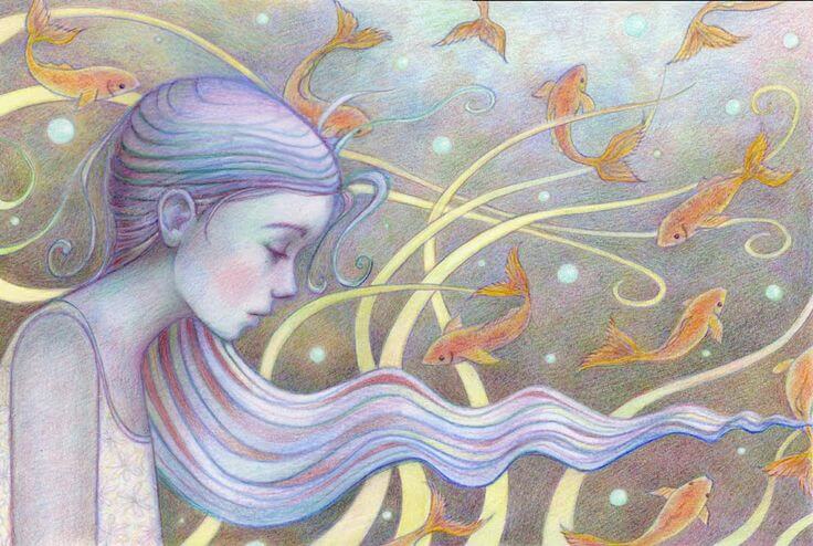 Niña triste con peces