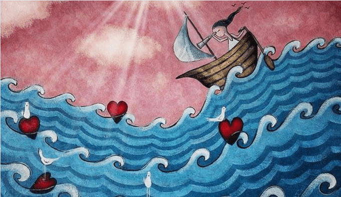 Niña navegando por el mar de corazones