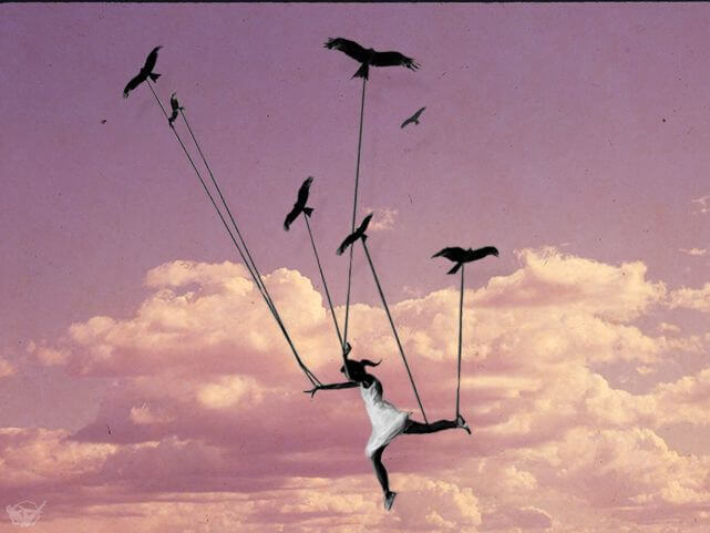Niña volando sujetada con cuerdas por pájaros