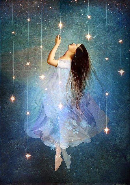 chica tocando las estrellas
