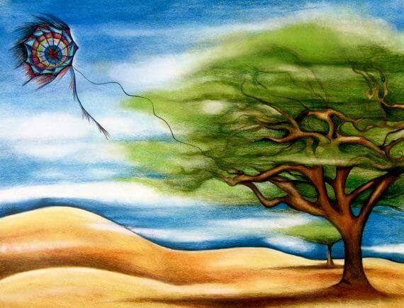 cometa enganchada a un árbol