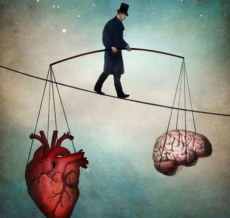 homme tenant le coeur et le cerveau