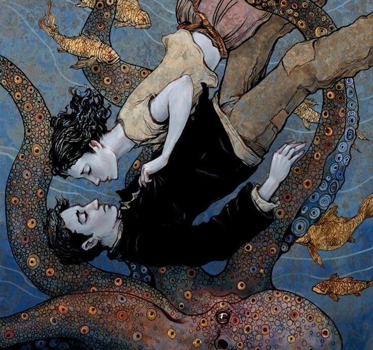 hombre y mujer bajo el mar