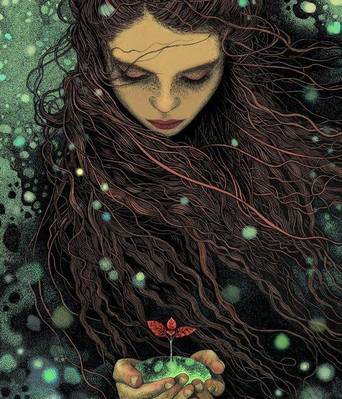 joven con planta entre las manos