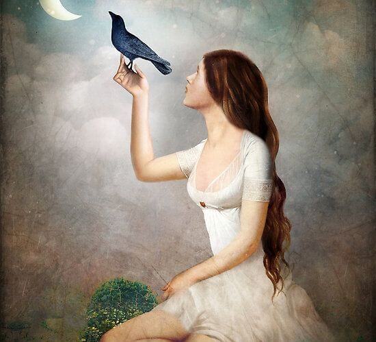 woman with a bird in her hand