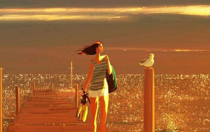 mujer paseando por muelle