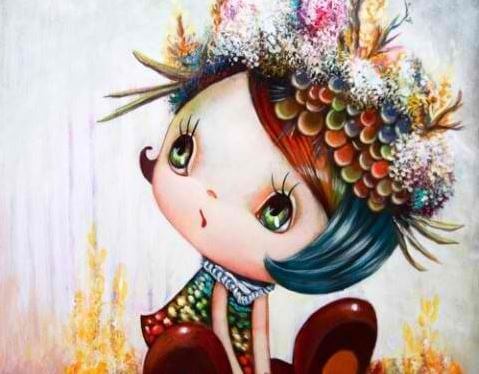 Niña con gorro de colores