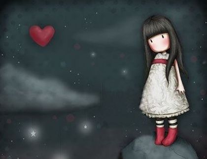 Niña triste con corazón