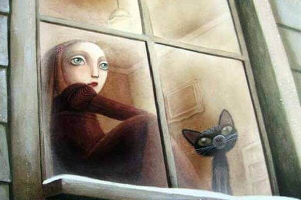 Niño con un gato en una ventana pensando en familias narcisistas