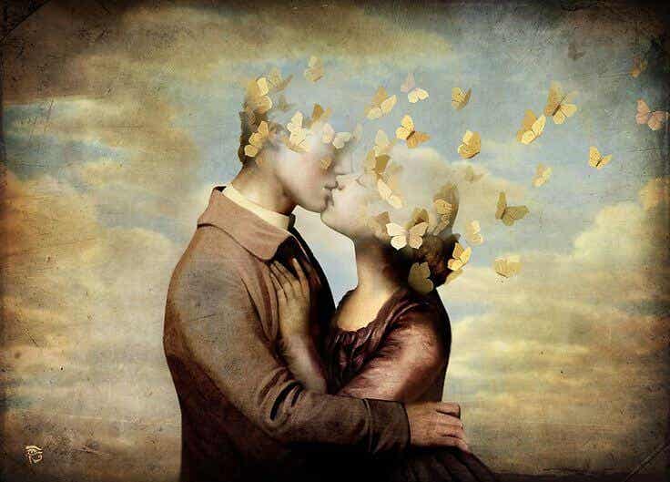 pareja besándose con cabeza en forma de mariposas