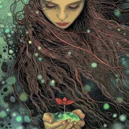 Mujer con una flor en sus manos