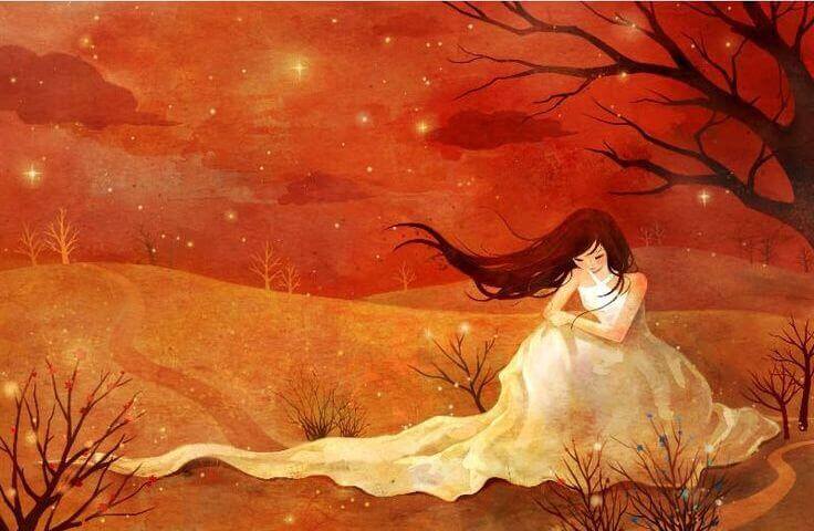 Femme triste et solitaire assise près d'un arbre