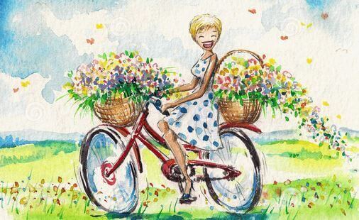 Garota de bicicleta rindo