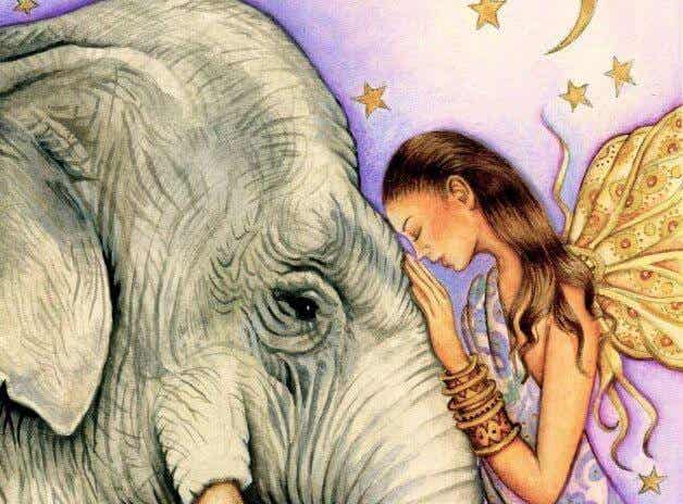 mujer con elefante pensando en hacer el bien