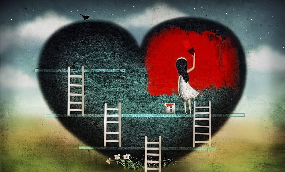 Mujer pintando un corazón