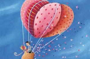 Pareja subida a un globo disfrutando de su amor