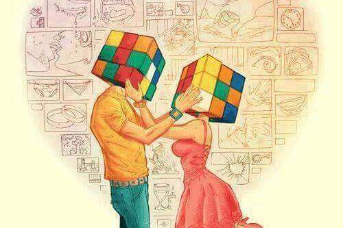 Pareja con cabeza de cubo de rubik