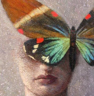 Sommerfugl foran persons ansigt