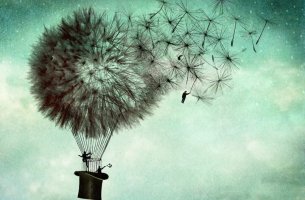 Hombres volando en globo de diente de león