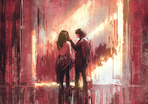 Pareja de jóvenes en una puerta