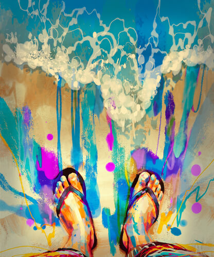 Pies con chanclas pisando arena