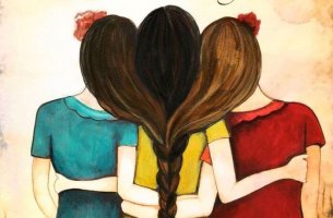 Abrazo de tres mujeres unidas