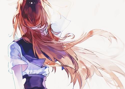 Mujer de espaldas con el pelo suelto